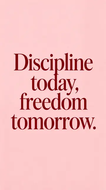 Deep burgundy serif quote "Discipline today, freedom tomorrow." centered on a blush pink phone wallpaper background.