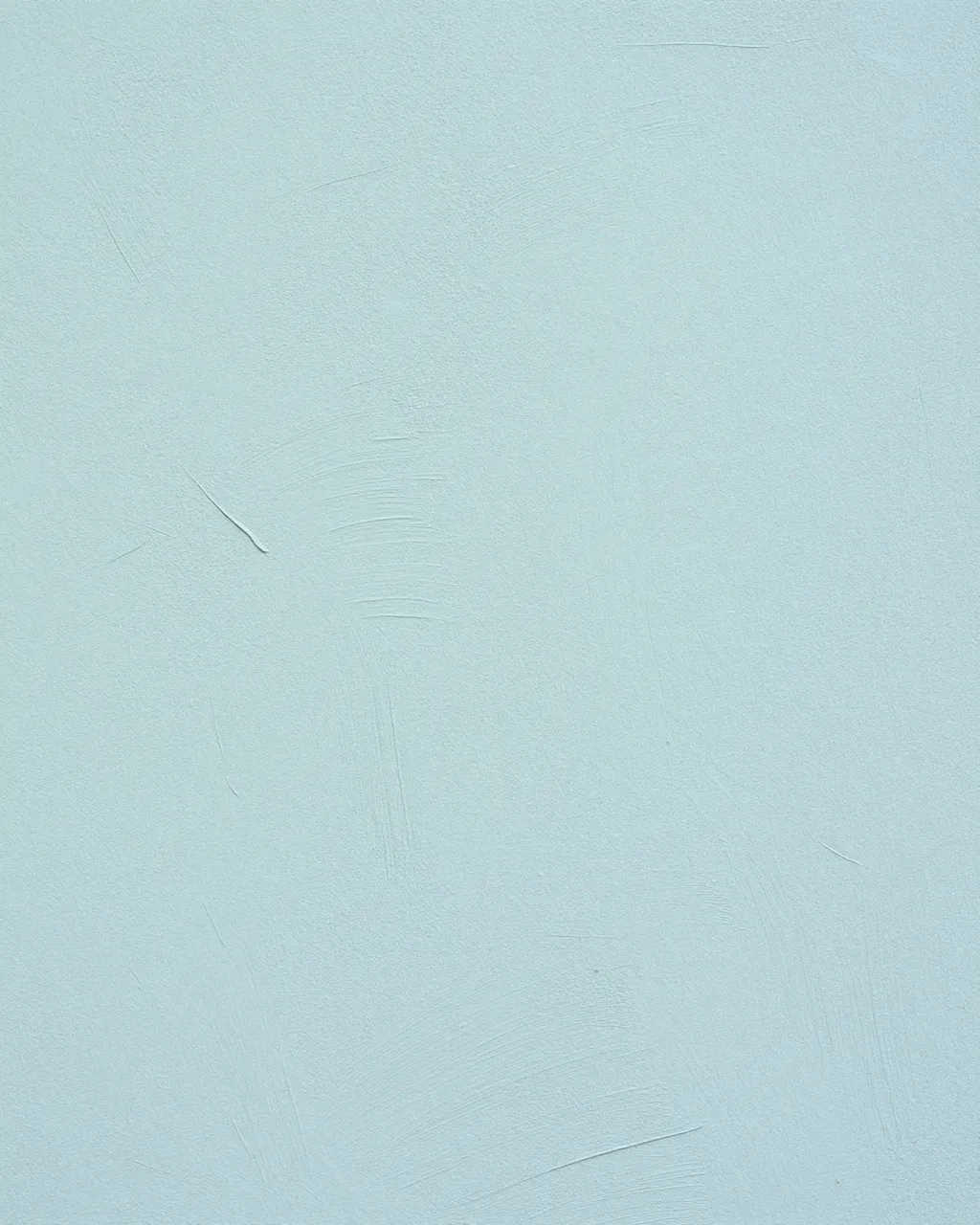 Full frame close-up of dusty blue lime plaster with subtle sweeping trowel marks under even flat light