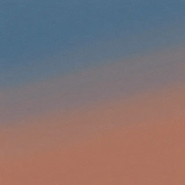 A smooth grainy gradient transitioning from dusty blue at the top to warm terracotta at the bottom