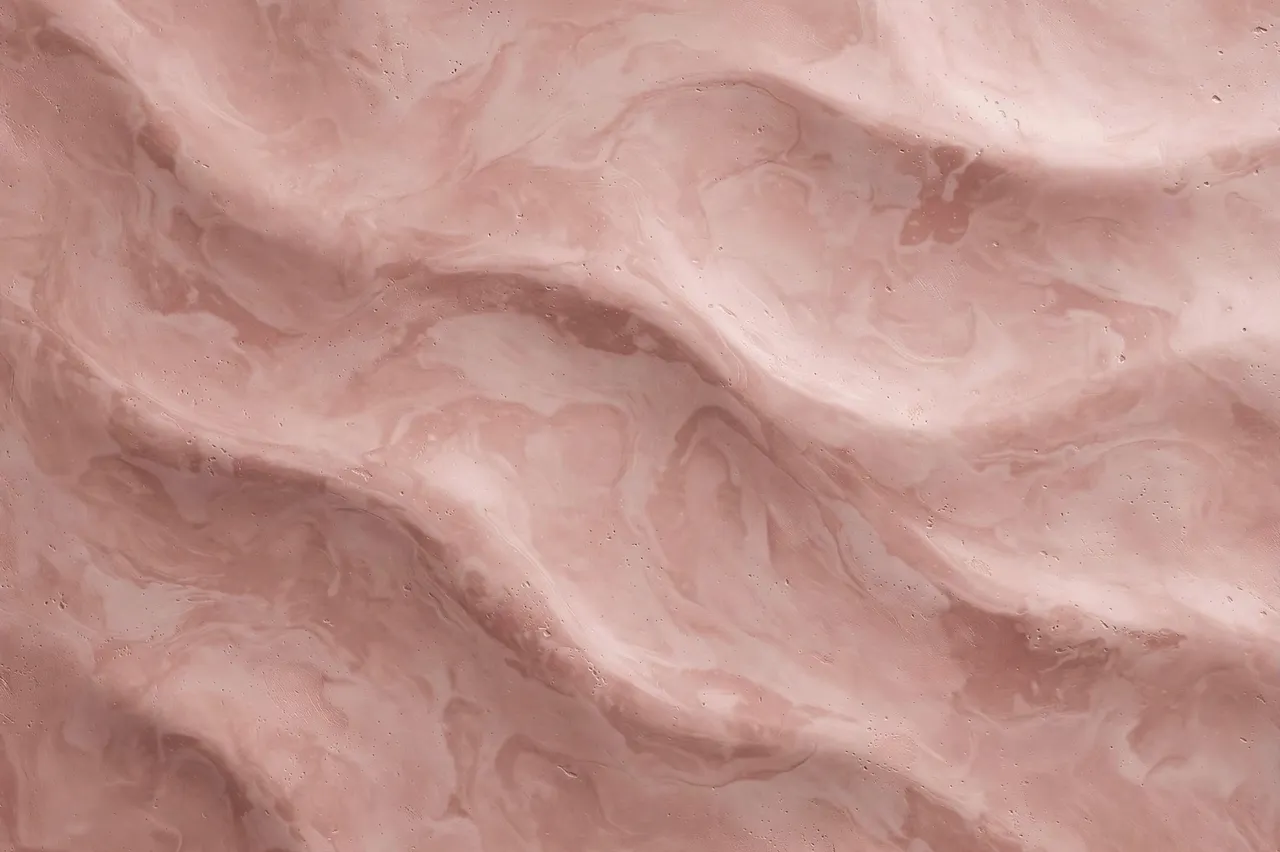 Full frame close-up of polished dusty pink tadelakt plaster with soft undulating swirled patterns