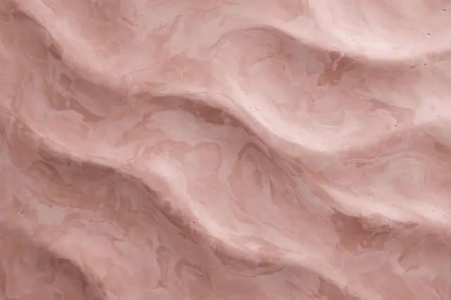 Full frame close-up of polished dusty pink tadelakt plaster with soft undulating swirled patterns