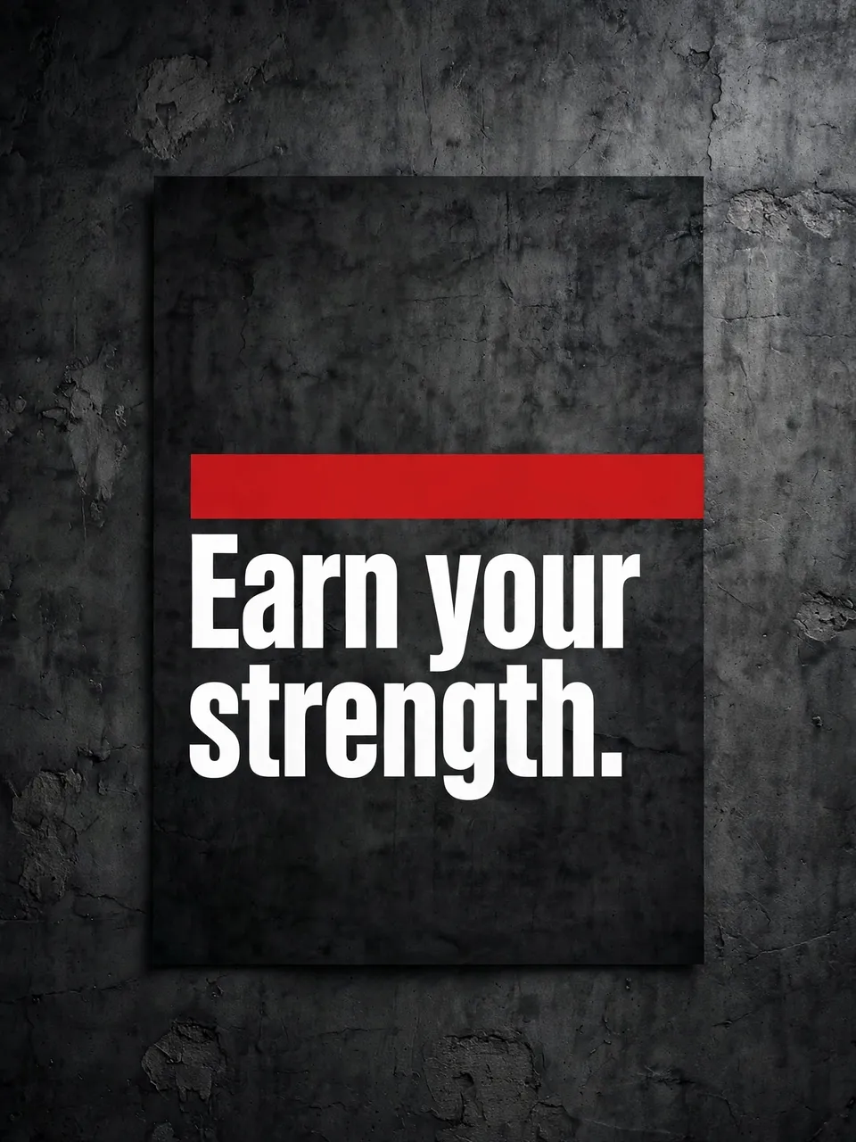 Motivational poster reading "Earn your strength." with a red stripe, mounted on a dark textured concrete wall