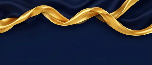 Flowing twisted glossy gold satin ribbon rests across the top of a deep navy blue background with empty copy space below.