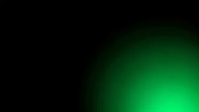 Smooth gradient background with a bright emerald green glow in the lower right fading into deep black
