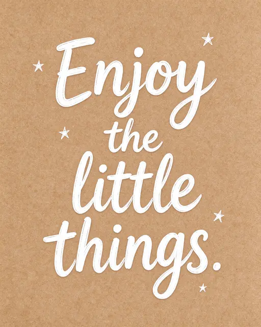 White hand-drawn lettering reading "Enjoy the little things." with small doodled stars on brown kraft paper.