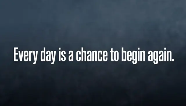 Bold white sans-serif text reading "Every day is a chance to begin again." centered on a dark slate gradient background