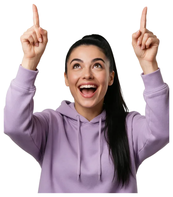 Excited young woman in a lilac hoodie points up with both index fingers while looking up with a big smile