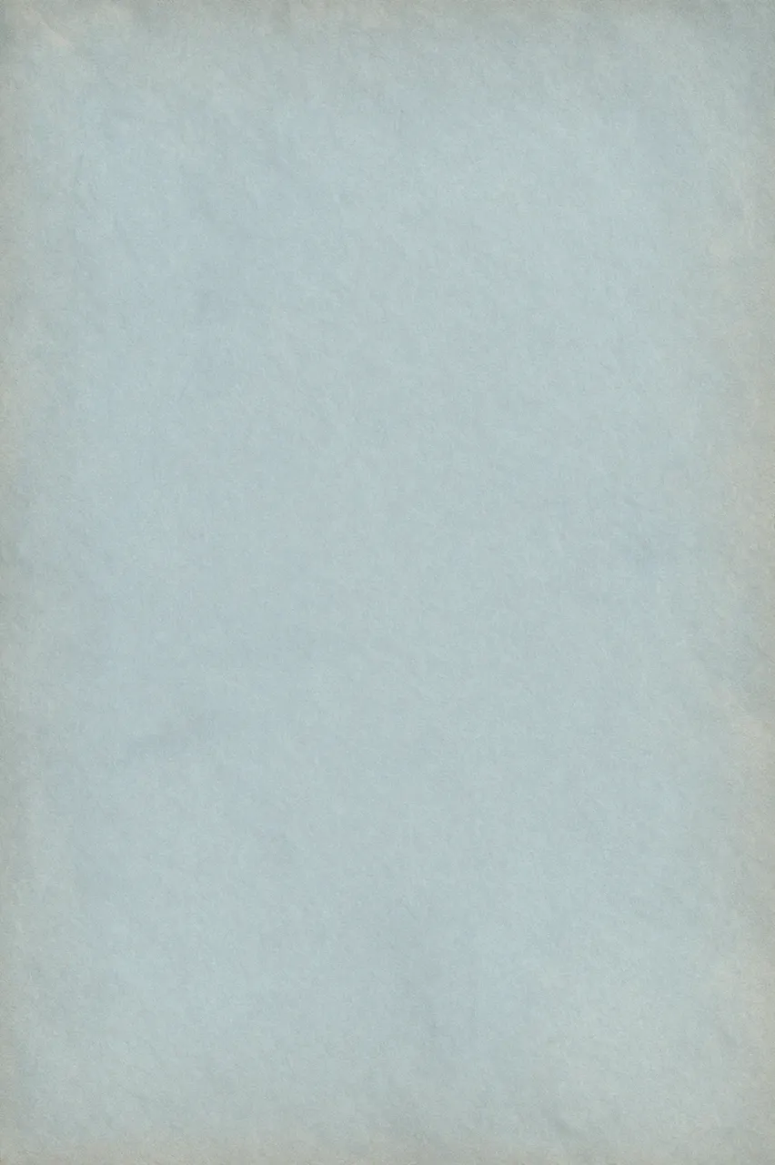 Full frame flat view of sun-faded blue-gray aged paper with soft mottled patina