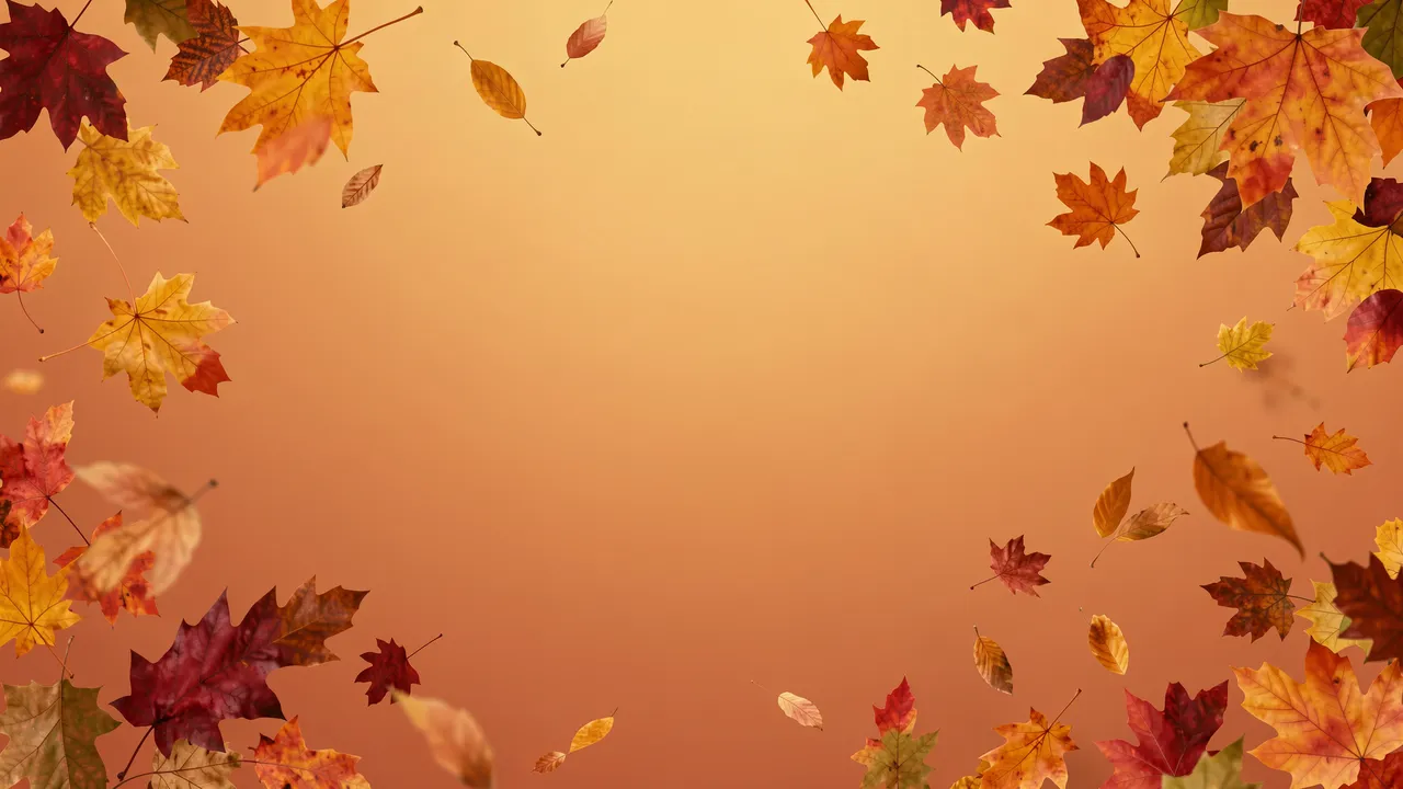 Colorful fall leaves fall around a blank warm orange gradient background