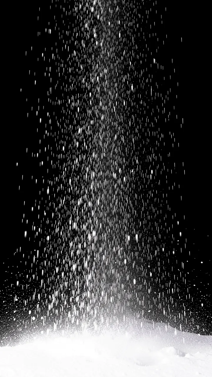 Vertical streaking falling snow appears against a solid black background, thinning toward the bottom above bright white