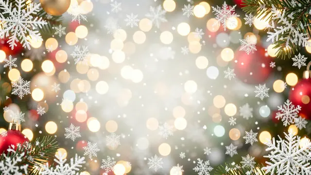 Christmas background with falling snowflakes, warm bokeh lights, pine branches, and central blank copy space