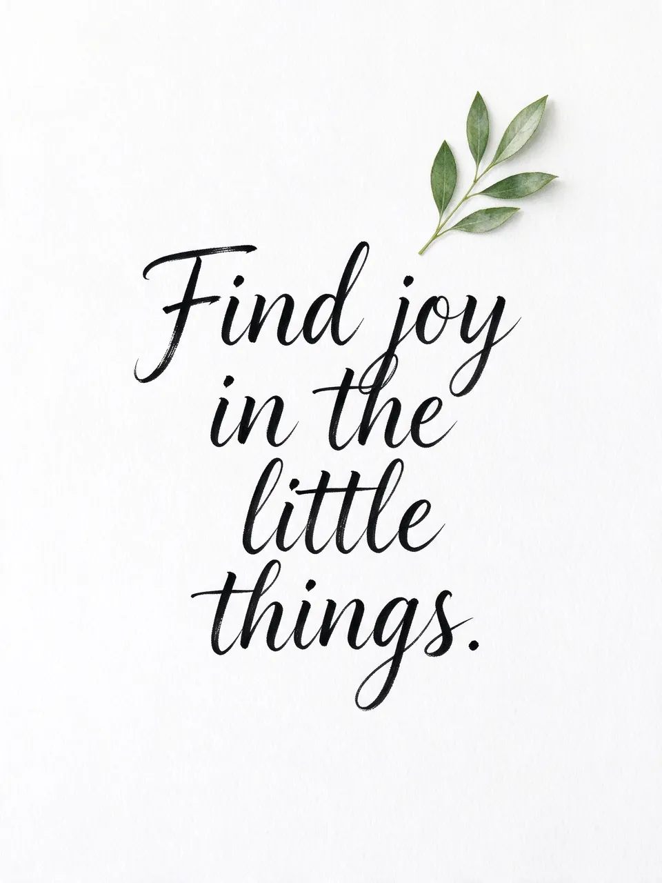 Black brush lettering reading "Find joy in the little things." paired with a small green leaf sprig on textured white