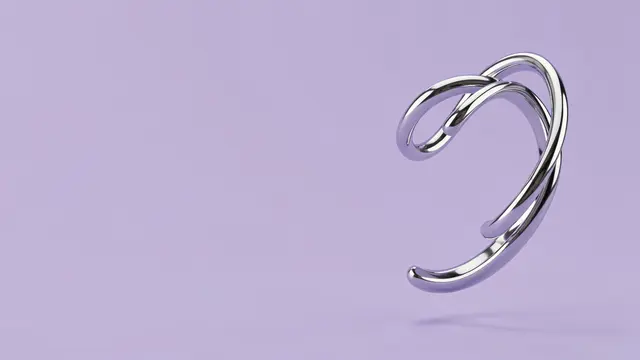 Twisted polished chrome rings float at the right side of a smooth soft lilac background with empty copy space.