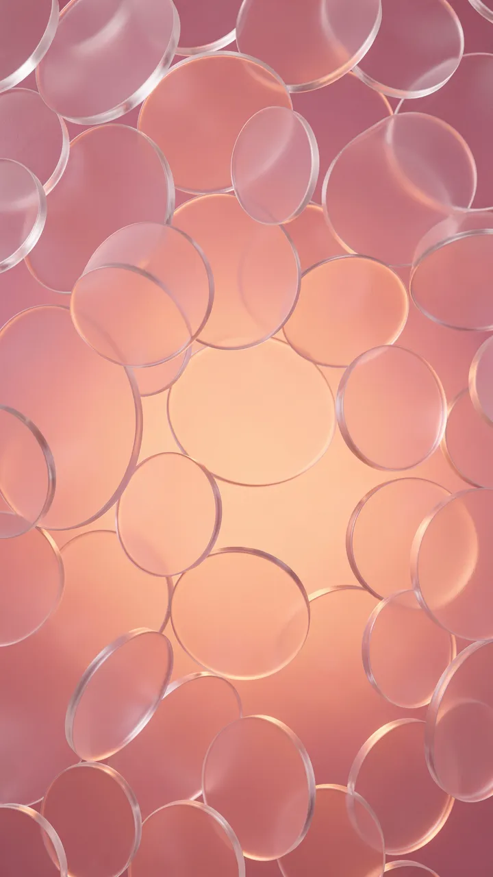 Translucent frosted glass discs float over a soft pink to orange vertical glowing gradient background