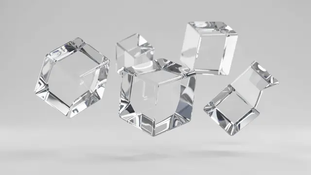Several translucent glass cubes float mid-air against a soft light gray background