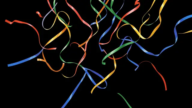 Curled multicolored thin ribbons tumble against a solid pure black background