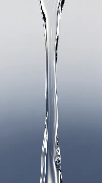 Vertical curved stream of transparent liquid glass against a soft light to dark gray gradient backdrop