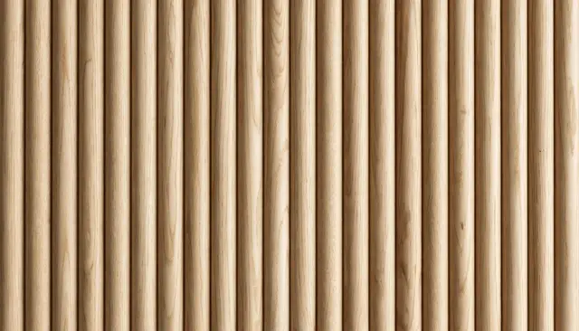 Full frame close-up of pale oiled fluted oak panelling with vertical rounded grooves and even soft lighting
