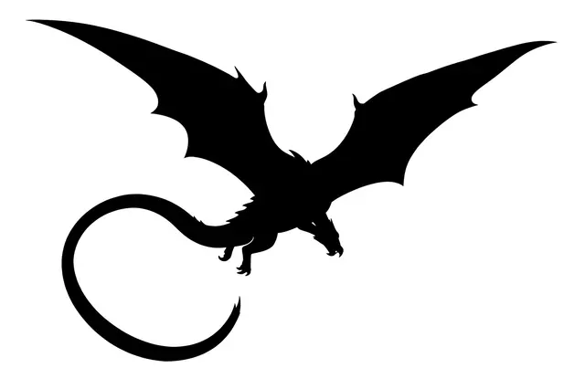 Solid black silhouette of a flying dragon with curled tail against a plain white background