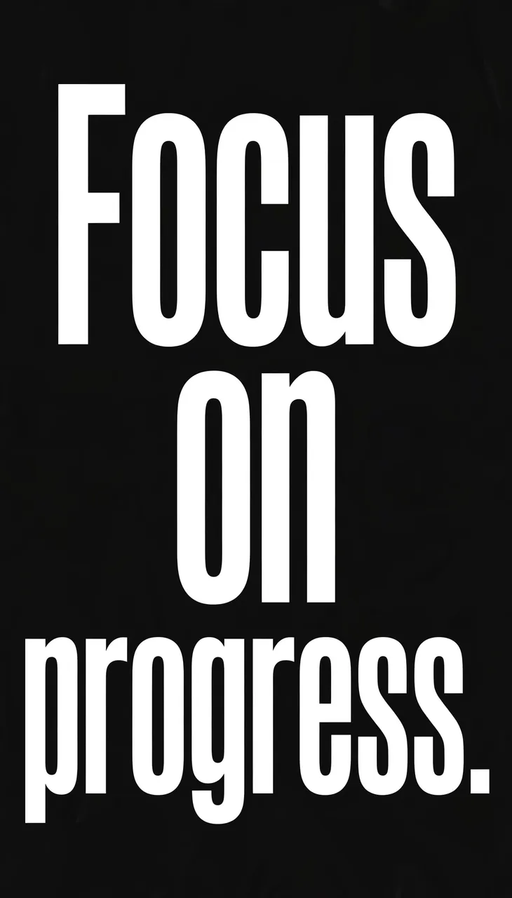 Bold white condensed text reading "Focus on progress." centered on a solid black vertical phone wallpaper background