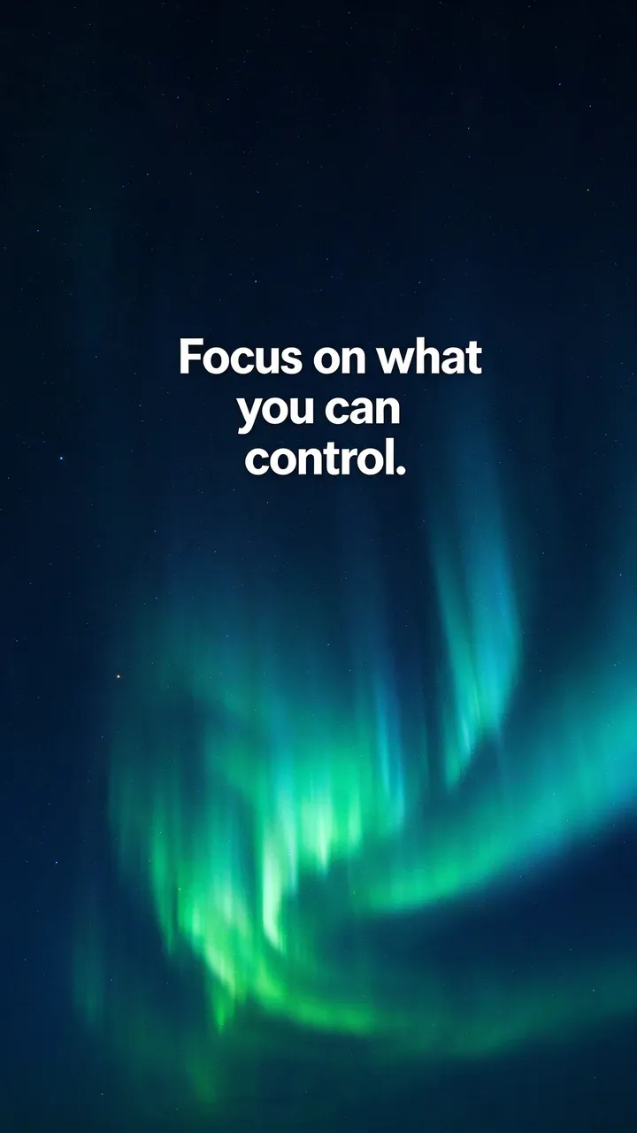 Bold white quote "Focus on what you can control." over a dark starry sky with green and teal aurora borealis glow