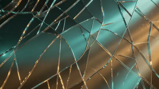 Layered fractured glass panels bend glowing teal and amber light across an abstract composition
