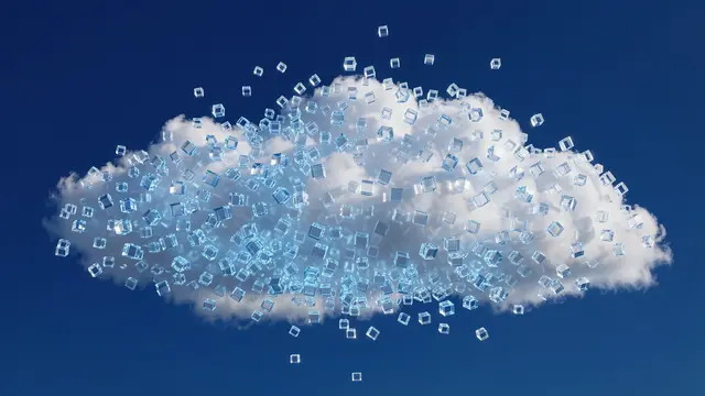 Floating cloud formation composed of glowing transparent glass cubes against a deep blue sky