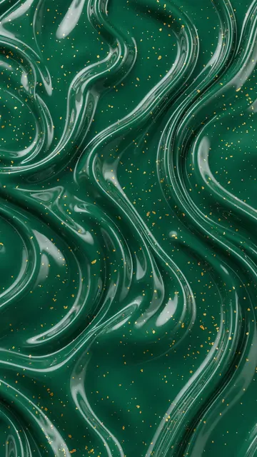 Vertical frame of swirling glossy emerald green liquid flecked with scattered gold particles