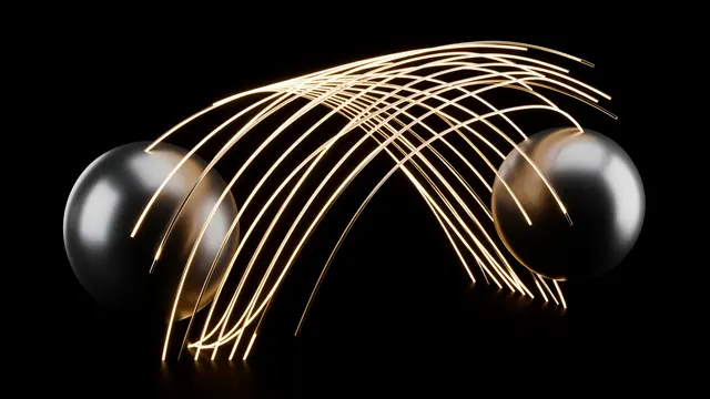 Golden glowing curved field lines arch between two polished metal spheres against a solid black background
