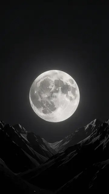 A large glowing full moon hangs over dark jagged mountain peaks against a deep black night sky