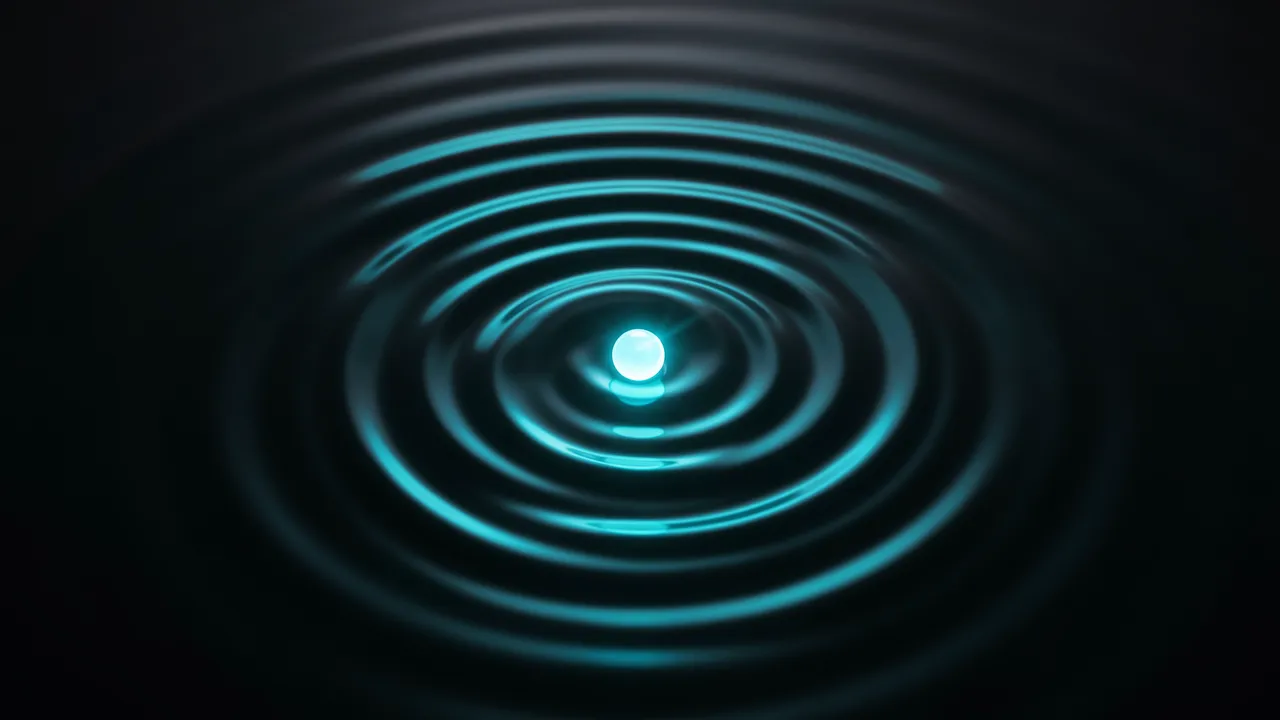 A small bright glowing orb sits at the center of spreading concentric cyan light ripples on a dark surface