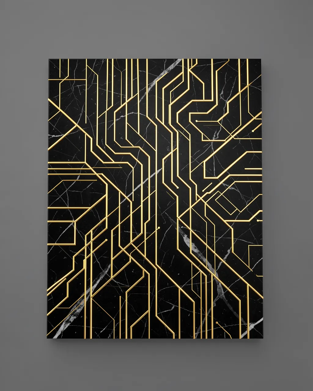 A polished black marble slab with inlaid gold circuit-style lines mounted against a plain gray background
