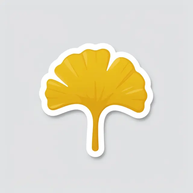 A die-cut sticker of a golden ginkgo leaf with a white border rests on a plain light gray background