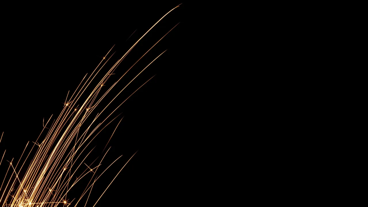 Long curved golden spark streaks arc upward from the bottom left against a solid pure black background