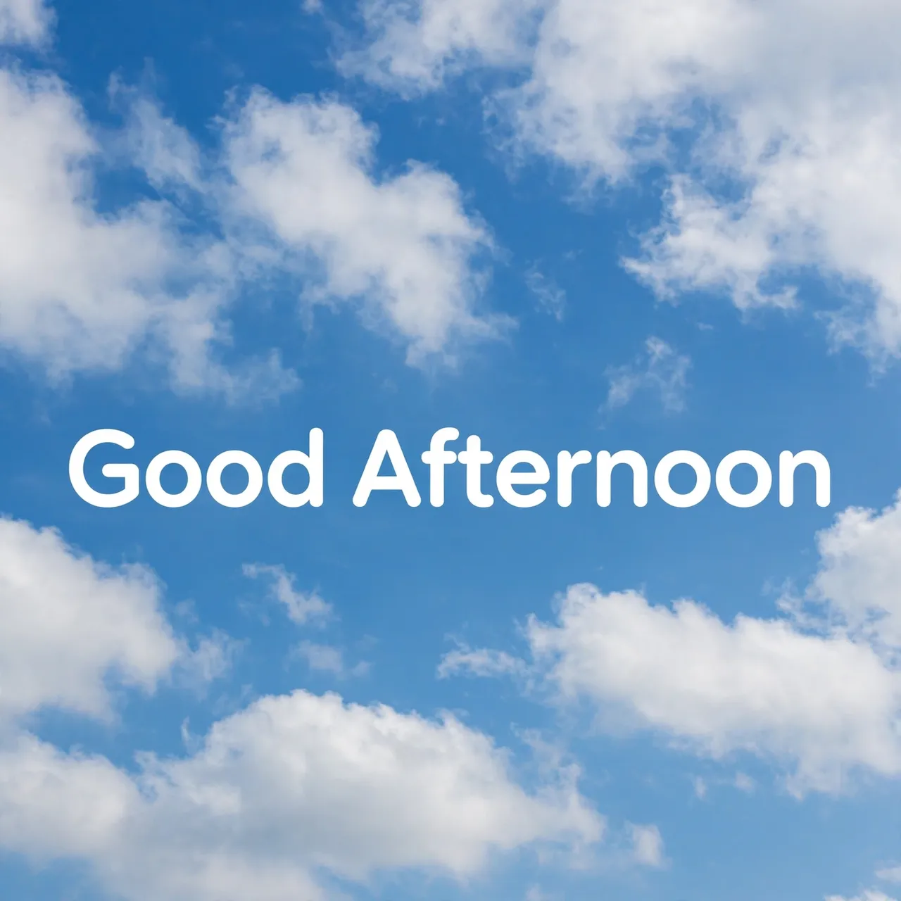 Centered bold white text reading "Good Afternoon" over a bright blue sky with soft fluffy white clouds
