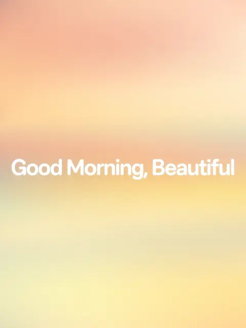 White centered rounded text reading "Good Morning, Beautiful" over a soft warm peach to pale yellow dawn gradient background