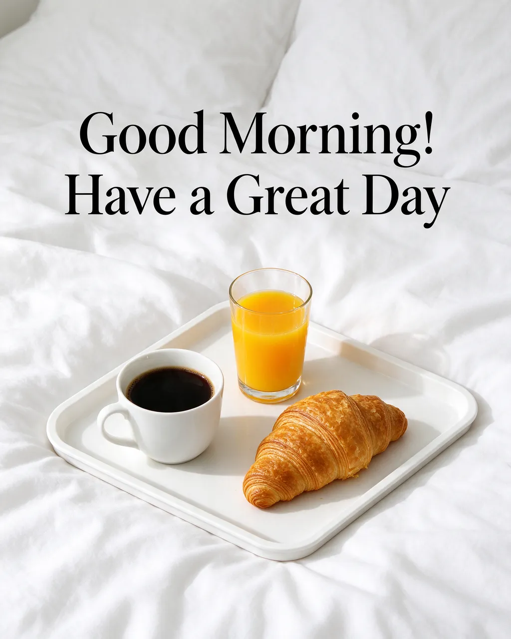 "Good Morning! Have a Great Day" text above a breakfast tray with coffee, orange juice, and a croissant on soft white