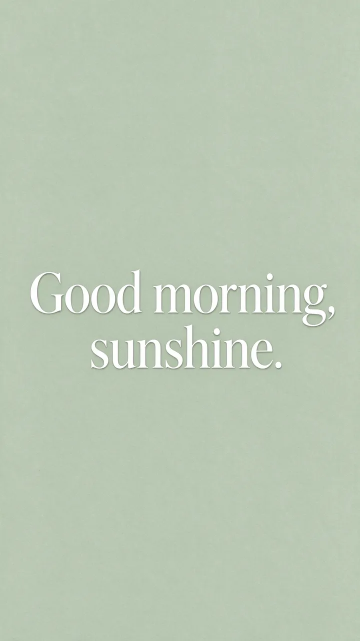 Centered white serif text reading "Good morning, sunshine." on a soft sage green textured background.