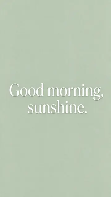 Centered white serif text reading "Good morning, sunshine." on a soft sage green textured background.