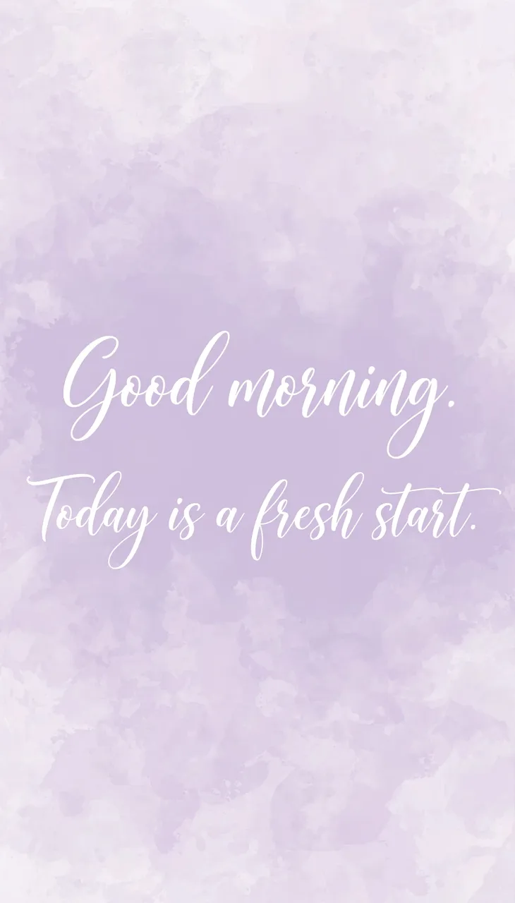 White flowing script text reading "Good morning. Today is a fresh start." centered on a soft lavender watercolor background