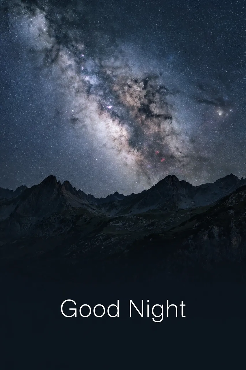 "Good Night" text in thin white sans-serif type below the Milky Way stretching over a dark silhouetted mountain ridge at