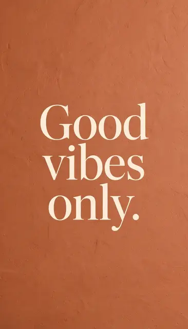 Cream serif text reading "Good vibes only." centered on a warm terracotta textured background