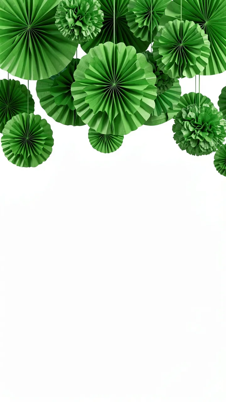 Hanging green pleated paper fans and pom-poms occupy the top edge above empty white copy space