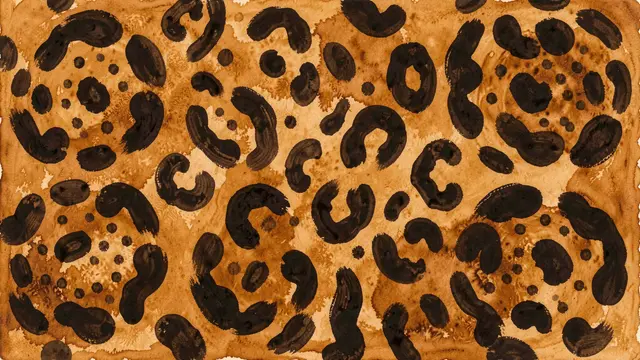 Irregular hand-painted jaguar rosette pattern in dark umber gouache on a warm amber background