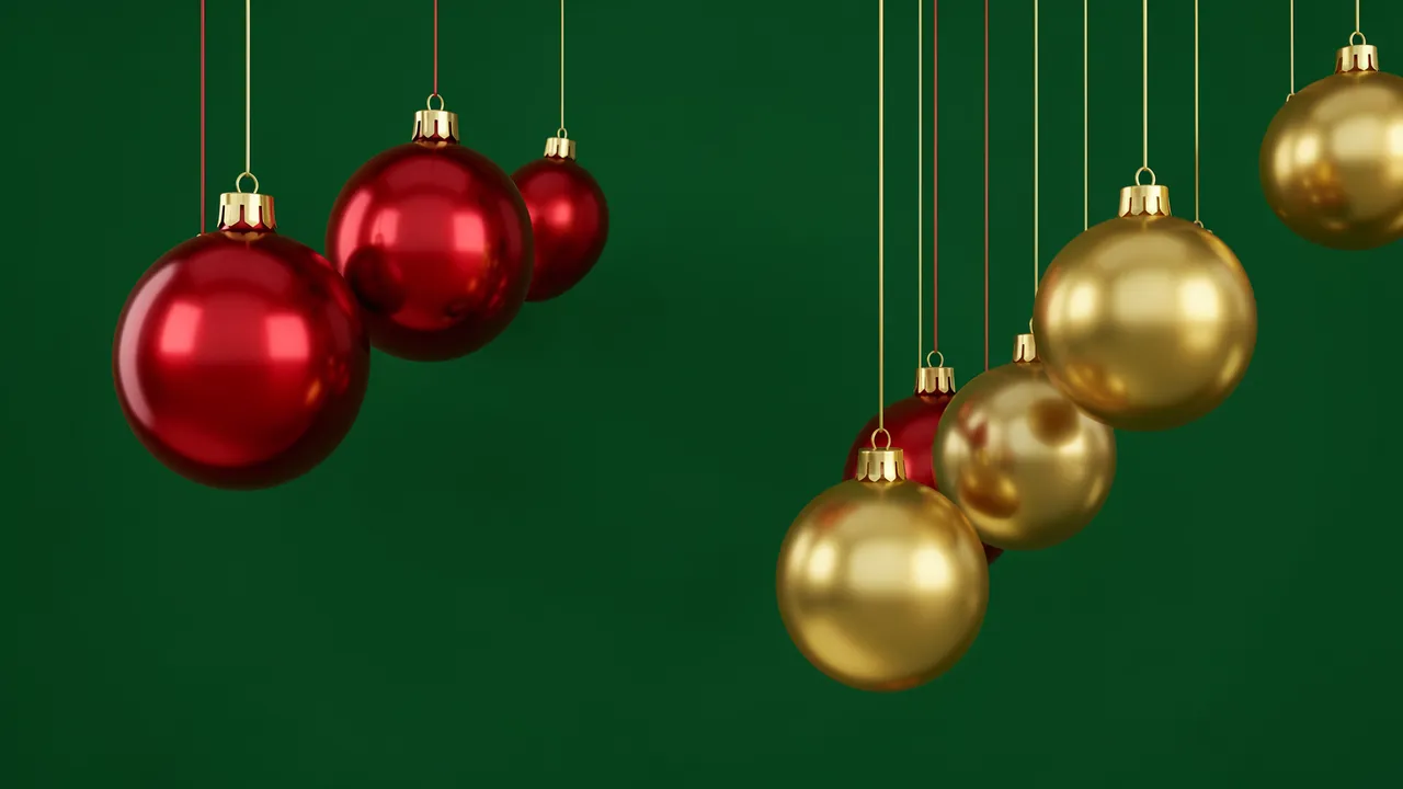Glossy red and gold Christmas baubles hang at varying heights against a solid deep green background