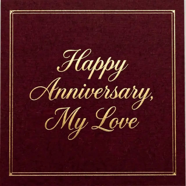 Gold foil script reading "Happy Anniversary, My Love" centered on a deep burgundy card with a thin gold frame