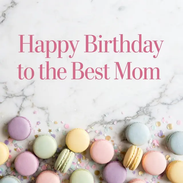"Happy Birthday to the Best Mom" rose pink serif text above pastel macarons and confetti on a white marble surface