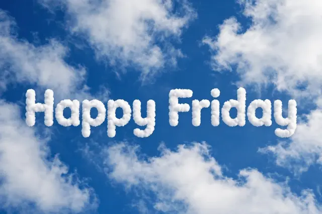 "Happy Friday" text formed from fluffy white clouds against a bright blue sky with scattered soft clouds