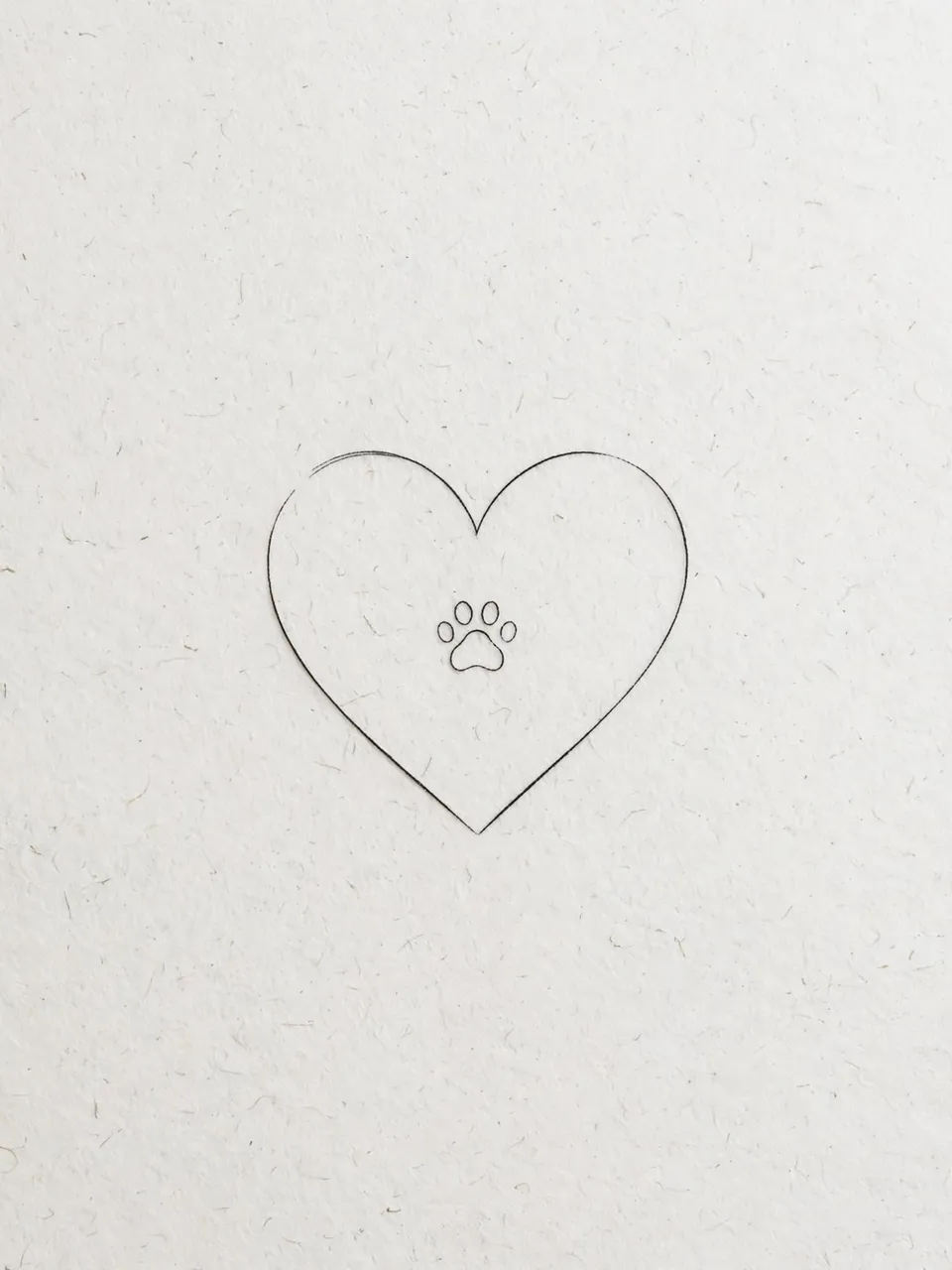 Delicate thin black ink line drawing of a heart outline containing a small paw print on textured white paper