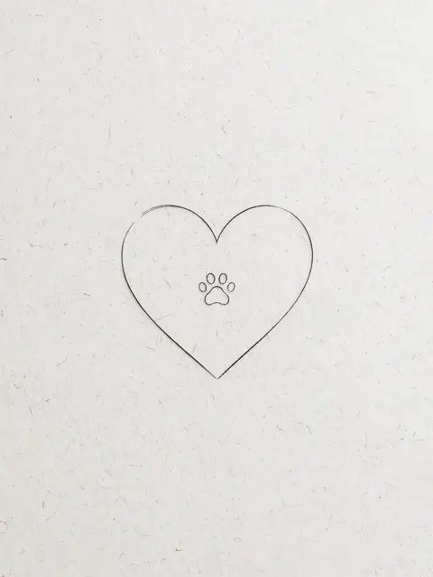 Delicate thin black ink line drawing of a heart outline containing a small paw print on textured white paper